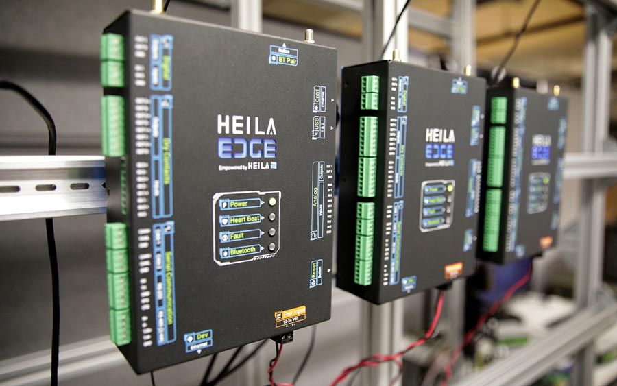 Three Heila control platform Edge devices mounted on racks.